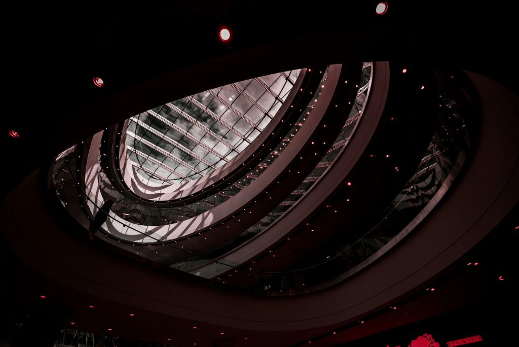 a very large building with a lot of lights inside of it